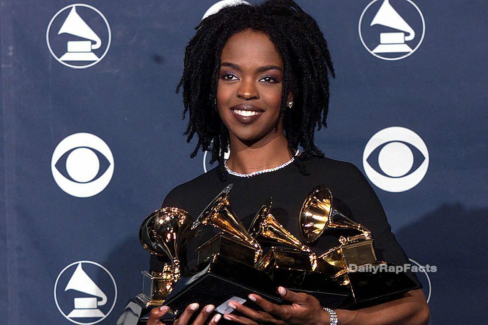 Lauryn Hill holding her Grammys
