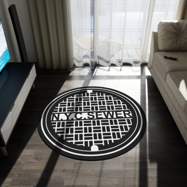 NYC Sewer Round Rug in living room