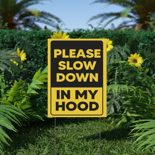 Please Slow Down In My Hood Yard Sign on a Yard
