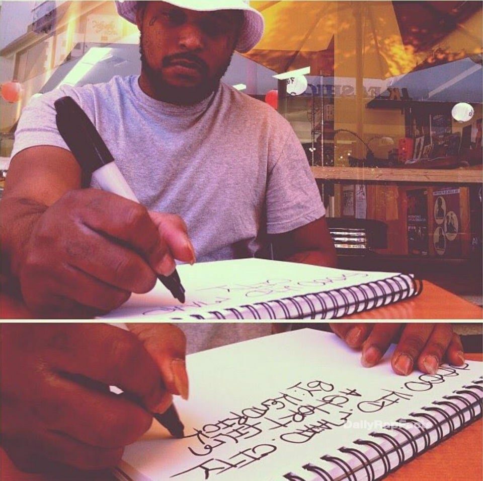 The handwriting on the cover of Kendrick Lamar's "good Kid, M.A.A.D City" album was done by Schoolboy Q